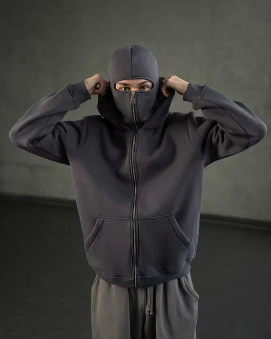 Charcoal balaclava hoodie for men and women with zip-up mask and hood, crafted from cozy fleece for urban streetwear versatility.