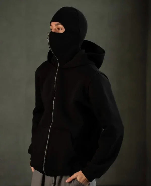 Unisex Ninja Balaclava Hoodie in black fleece with full zip-up mask and hood, blending streetwear style and warmth for urban fashion lovers.