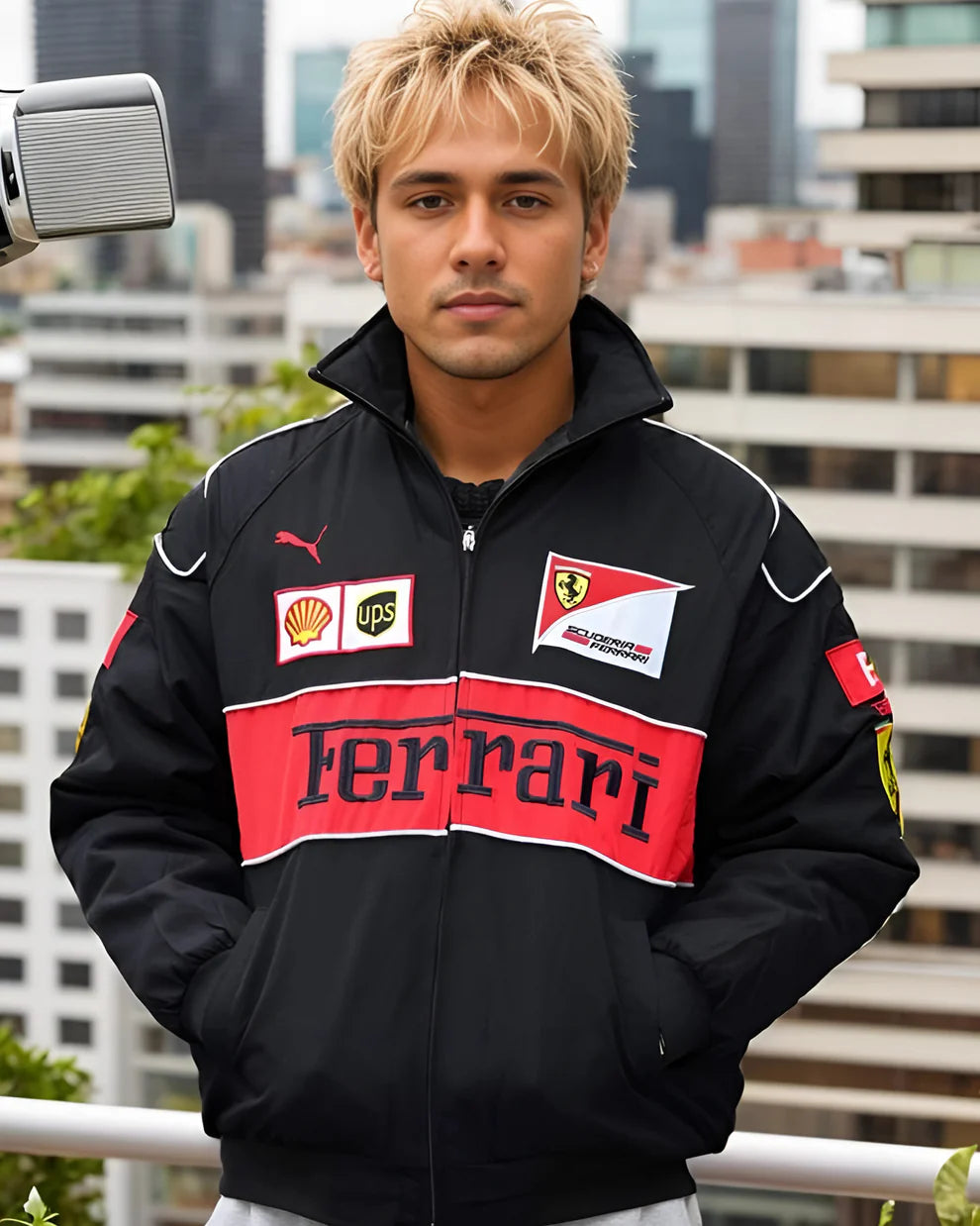 Premium Ferrari Racing Jacket – F1 Streetwear Edition worn by a model on a rooftop, showcasing bold Ferrari branding and motorsport sponsor logos.