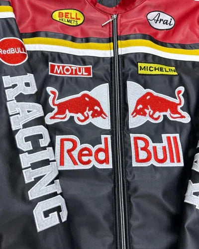 Red Bull Leather Jacket - High-Octane Design | Streetwear Vibe featuring bold Red Bull logos, racing patches, and a zip-up front in black and red.